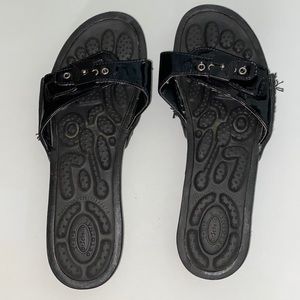 Black rock on slide sandals